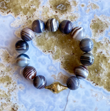 ITALIAN BANDED AGATE STRETCH BRACELET WITH 18K YELLOW GOLD CROWNWORK BEAD