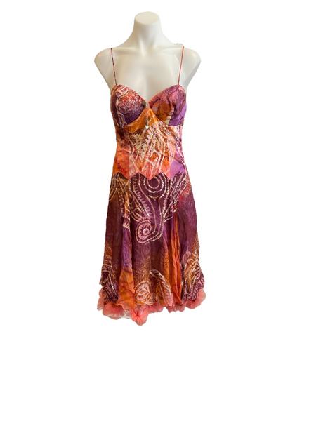 Flirty, short dress from Diane Freis in oranges and red