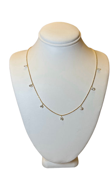FLOATING DIAMOND NECKLACE WITH SEVEN DIAMONDS